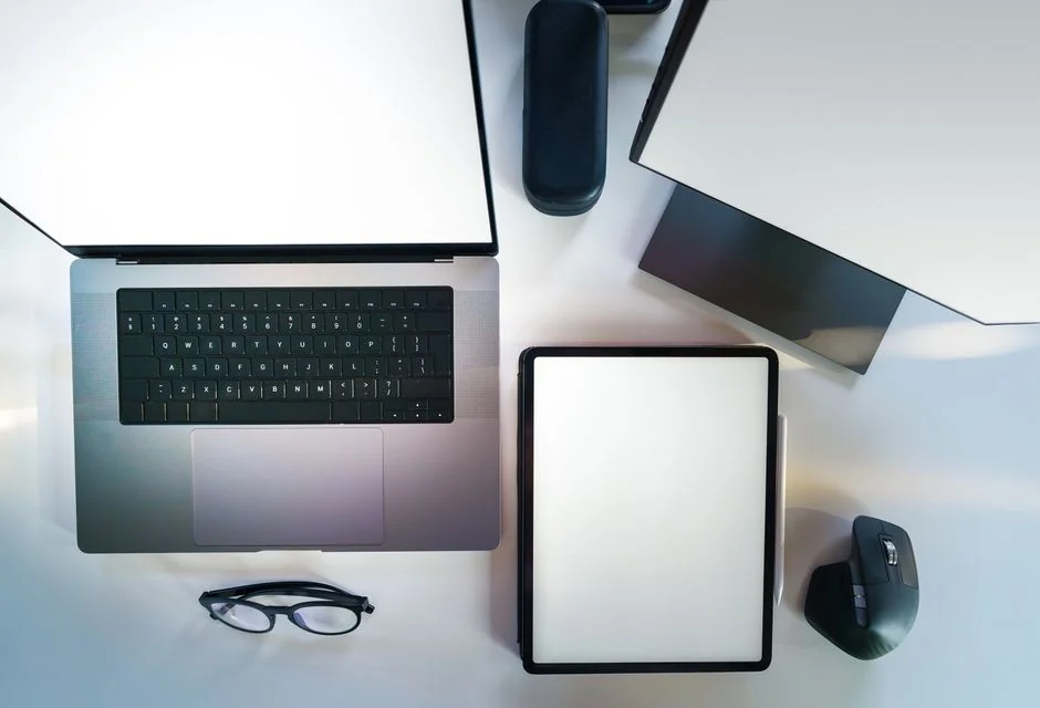 why-choose-us A contemporary workspace showcasing a laptop, tablet, and smartphones, ideal for tech and freelance use.